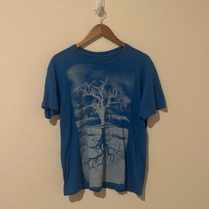 Blue soft cotton T-shirt with a tree design